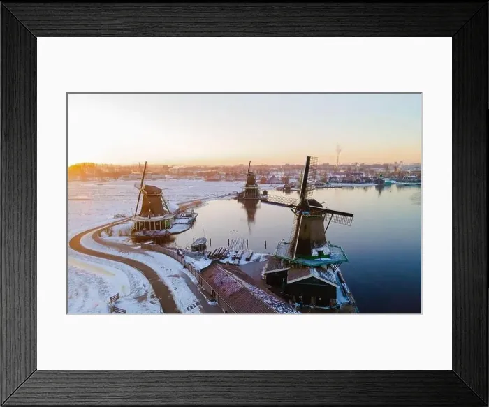 Framed Print : Zaanse Schans windmill village during winter with snow landscape in the Netherlands Holland village in winter