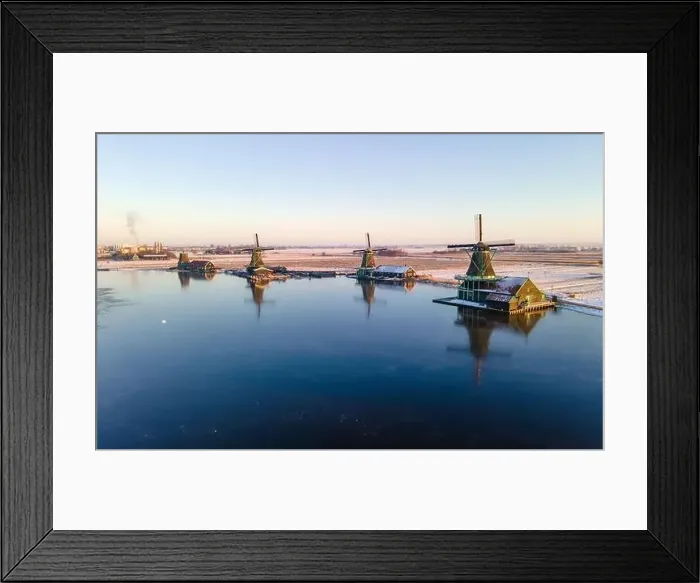 Framed Print : Windmill village during winter with snow in the Netherlands Holland Zaanse Schans village in winter