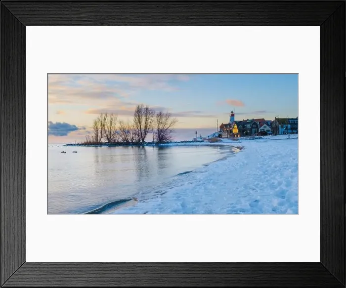 Framed Print : Lighthouse of Urk during winter with snow landscape in the Netherlands Framed Print : Lighthouse of Urk during winter with snow landscape in the Netherlands