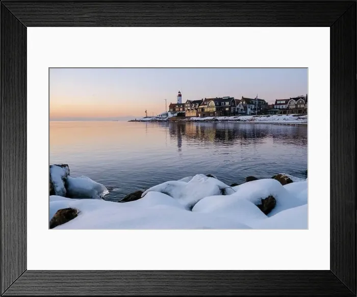 Framed Print : Lighthouse of Urk during winter with snow landscape in the Netherlands Framed Print : Lighthouse of Urk during winter with snow landscape in the Netherlands