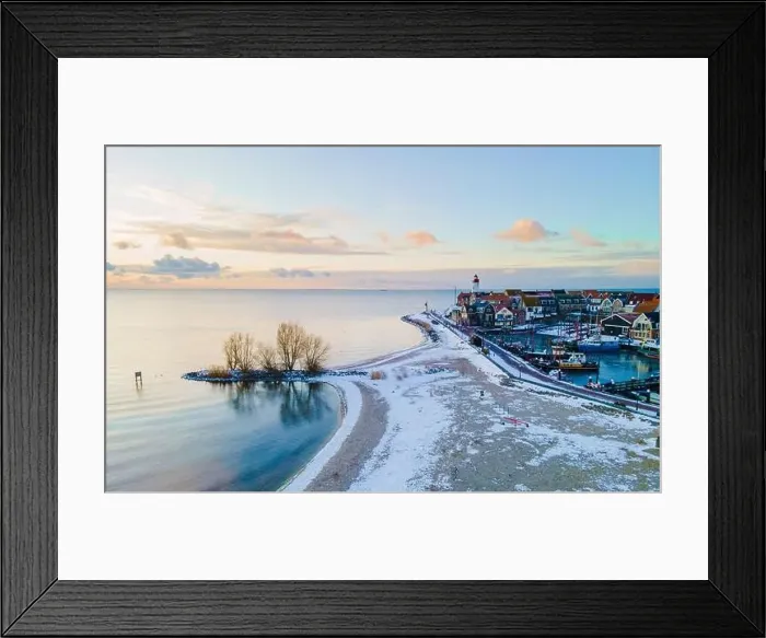 Framed Print : Lighthouse of Urk during winter with snow landscape in the Netherlands. Dutch village in winter Framed Print : Lighthouse of Urk during winter with snow landscape in the Netherlands. Dutch village in winter