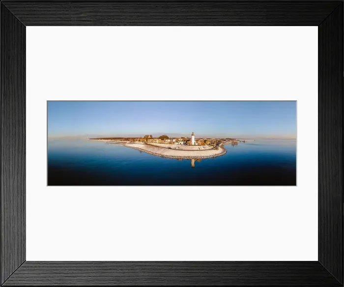 Framed Print : Lighthouse of Urk with snow landscape during winter in the Netherlands Framed Print : Lighthouse of Urk with snow landscape during winter in the Netherlands