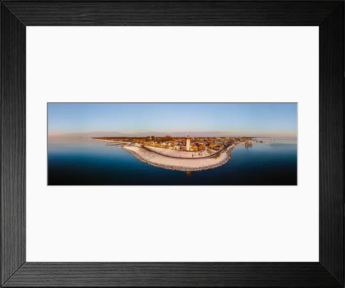 Framed Print : Drone view of the Lighthouse of Urk during winter with snow landscape in the Netherlands