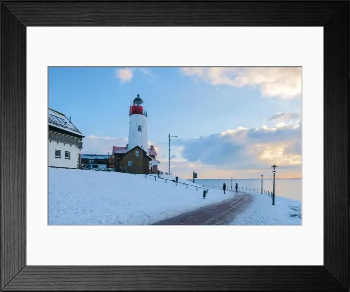 Framed Print : Lighthouse of Urk during winter with snow landscape in the Netherlands on a sunny day Framed Print : Lighthouse of Urk during winter with snow landscape in the Netherlands on a sunny day