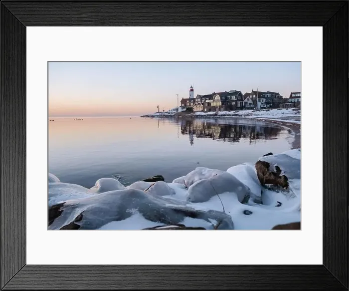 Framed Print : Lighthouse of Urk during winter with snow landscape in the Netherlands Framed Print : Lighthouse of Urk during winter with snow landscape in the Netherlands