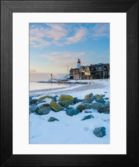 Framed Print : Lighthouse of Urk during winter with snow landscape in the Netherlands Framed Print : Lighthouse of Urk during winter with snow landscape in the Netherlands