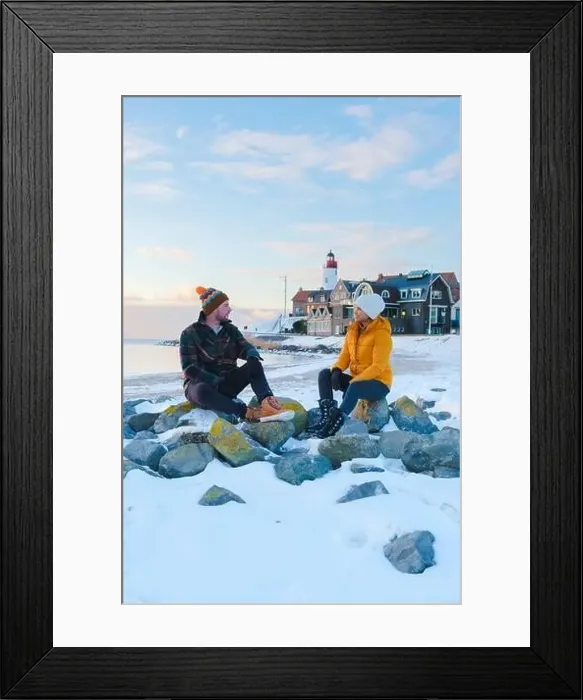 Framed Print : Lighthouse of Urk during winter with snow landscape in the Netherlands Framed Print : Lighthouse of Urk during winter with snow landscape in the Netherlands
