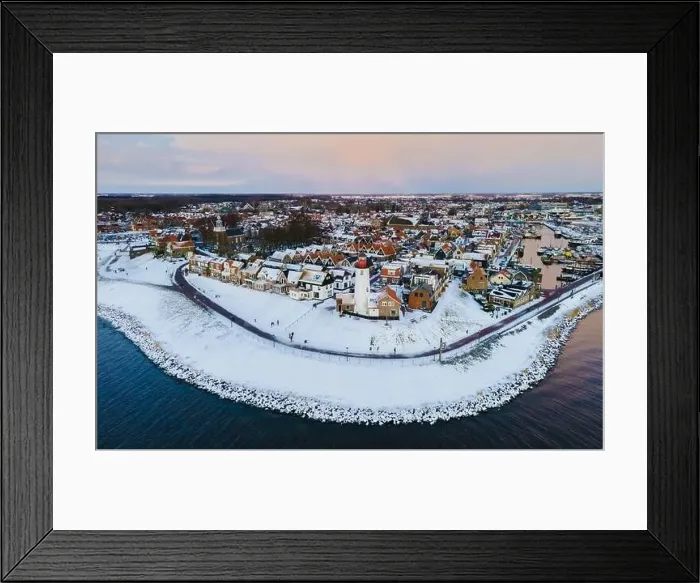Framed Print : Urk lighthouse during winter with snow landscape in the Netherlands Framed Print : Urk lighthouse during winter with snow landscape in the Netherlands