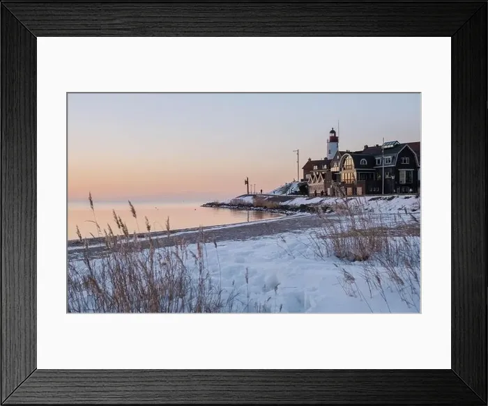 Framed Print : Lighthouse of Urk during winter with snow landscape in the Netherlands at sunset Framed Print : Lighthouse of Urk during winter with snow landscape in the Netherlands at sunset