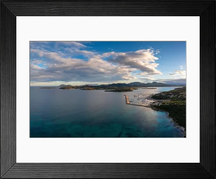 Framed Print : A view of the coast and harbor of Portisco in Sardinia Framed Print : A view of the coast and harbor of Portisco in Sardinia