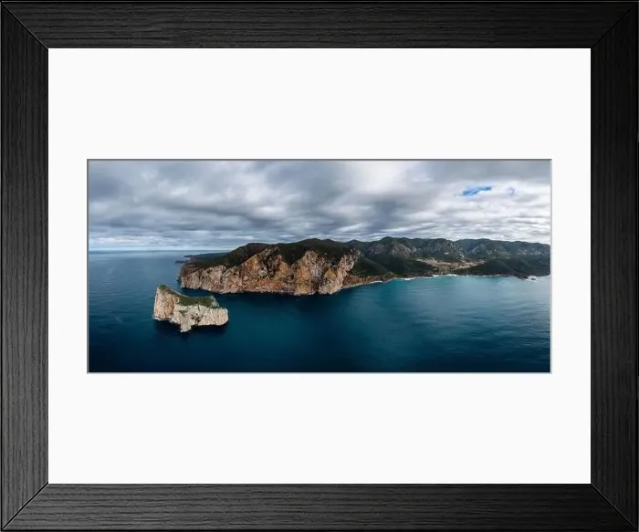 Framed Print : Drone panorama landscape of the cliffs and sea stacks at Porto Flavia on Sardinia Framed Print : Drone panorama landscape of the cliffs and sea stacks at Porto Flavia on Sardinia