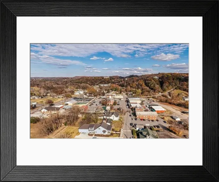 Framed Print : Aerial panorama view of a small southern town square with whiskey barrel houses on the hill Framed Print : Aerial panorama view of a small southern town square with whiskey barrel houses on the hill