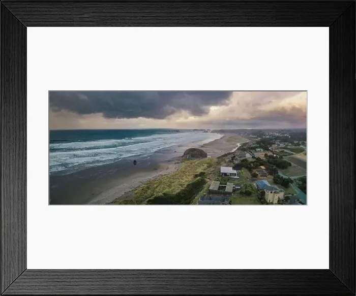 Framed Print : Storm clouds at sunset over homes at the Oregon Coast Framed Print : Storm clouds at sunset over homes at the Oregon Coast