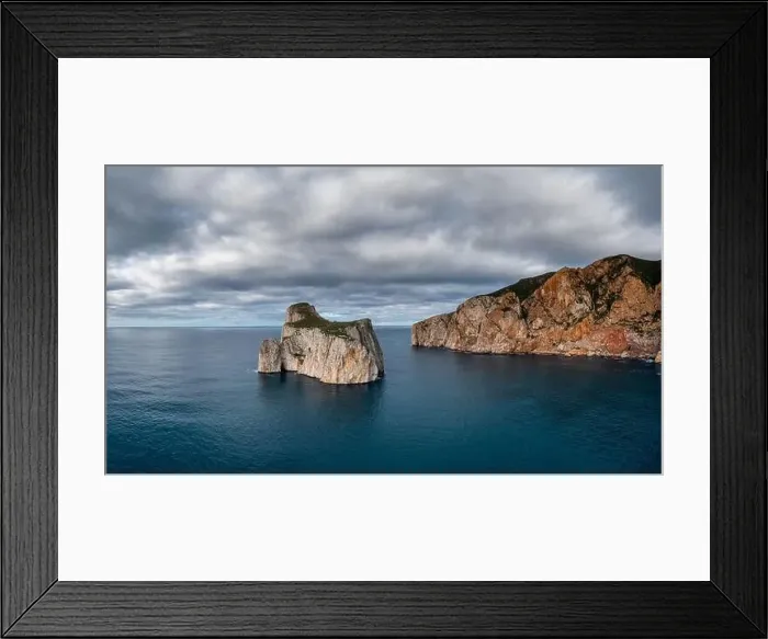 Framed Print : Drone panorama landscape of the cliffs and sea stacks at Porto Flavia on Sardinia Framed Print : Drone panorama landscape of the cliffs and sea stacks at Porto Flavia on Sardinia
