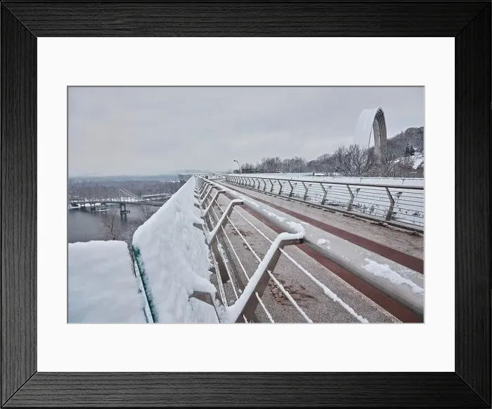 Framed Print : Pedestrian-bicycle bridge in Kiev in snowy weather Framed Print : Pedestrian-bicycle bridge in Kiev in snowy weather