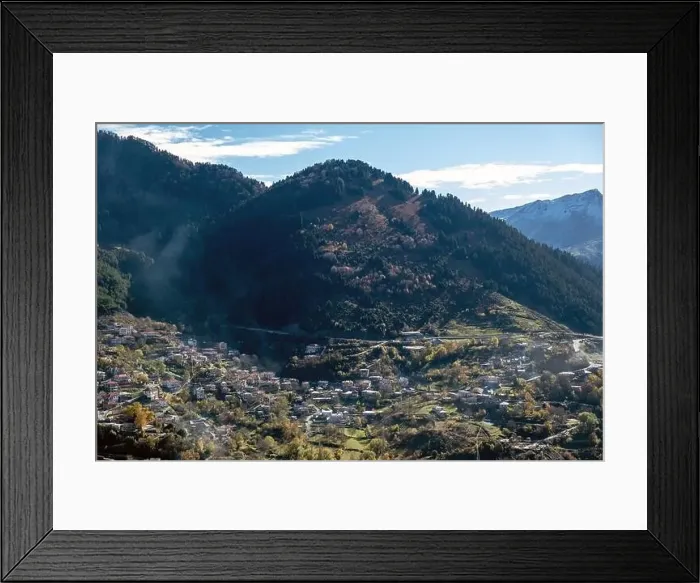 Framed Print : Anilio, Epirus Greece. Aerial view of traditional village on Pindus mountain, near Metsovo, cloudy blue sky background Framed Print : Anilio, Epirus Greece. Aerial view of traditional village on Pindus mountain, near Metsovo, cloudy blue sky background