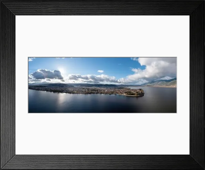 Framed Print : Greece, Ioannina city. Aerial panoramic drone view of Giannena and Lake Pamvotis, cloudy blue sky. Epirus Framed Print : Greece, Ioannina city. Aerial panoramic drone view of Giannena and Lake Pamvotis, cloudy blue sky. Epirus