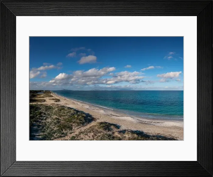 Framed Print : An aerial view of a secluded and long sandy beach with turquoise ocean water Framed Print : An aerial view of a secluded and long sandy beach with turquoise ocean water