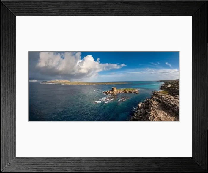 Framed Print : A view of the Spiaggia la Pelosa with the Pelosa Watchtower near Stintino in Sardinia Framed Print : A view of the Spiaggia la Pelosa with the Pelosa Watchtower near Stintino in Sardinia