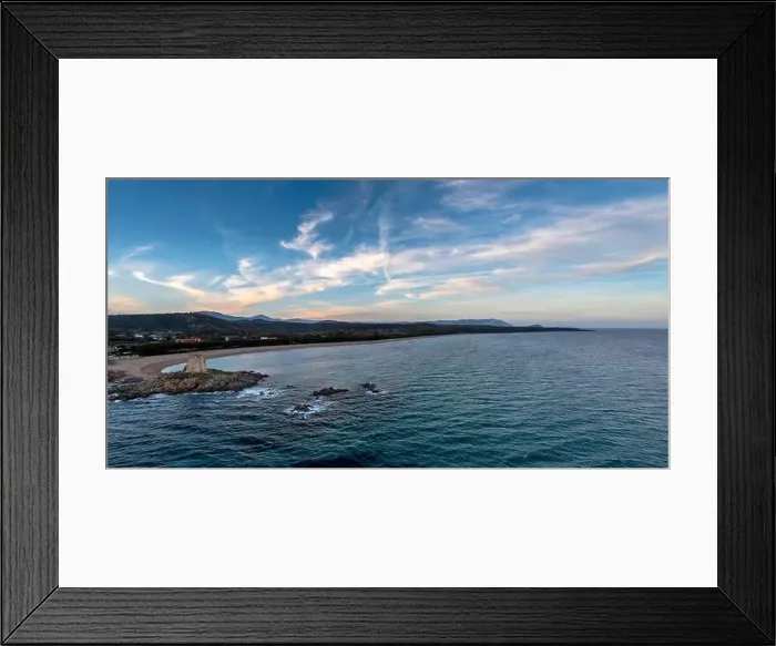 Framed Print : An aerial panorama landscape of the Torre di Barisardo beach on the east coast of Sardinia at dusk Framed Print : An aerial panorama landscape of the Torre di Barisardo beach on the east coast of Sardinia at dusk