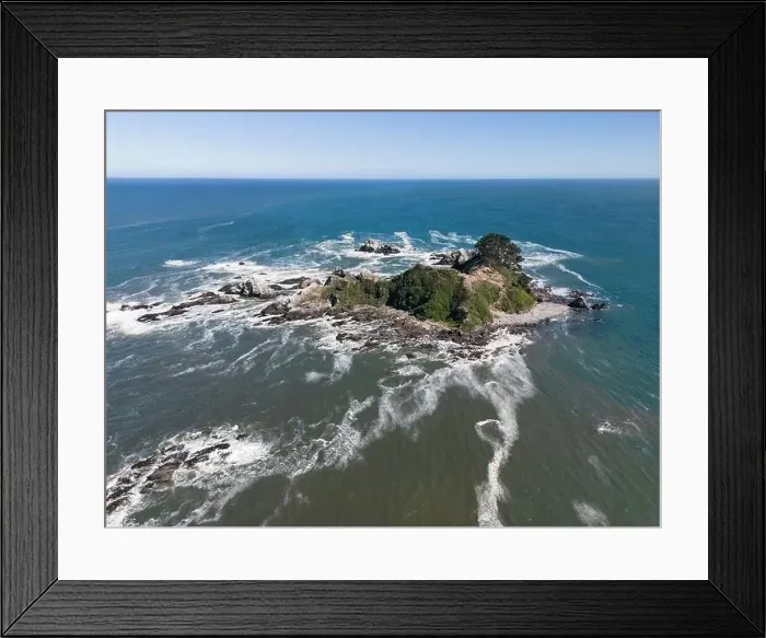 Framed Print : Aerial shot of the picturesque Isla Maiquillahue in the Pacific Ocean of Chile Framed Print : Aerial shot of the picturesque Isla Maiquillahue in the Pacific Ocean of Chile