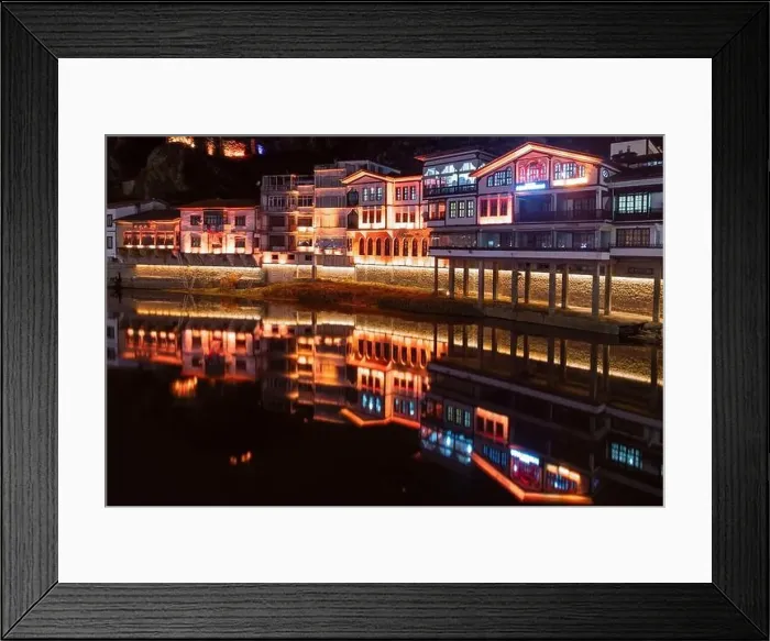 Framed Print : Amasya, Turkey - December 22, 2022 : Old Ottoman houses and clock tower view by the Yesilirmak River in Amasya City Framed Print : Amasya, Turkey - December 22, 2022 : Old Ottoman houses and clock tower view by the Yesilirmak River in Amasya City