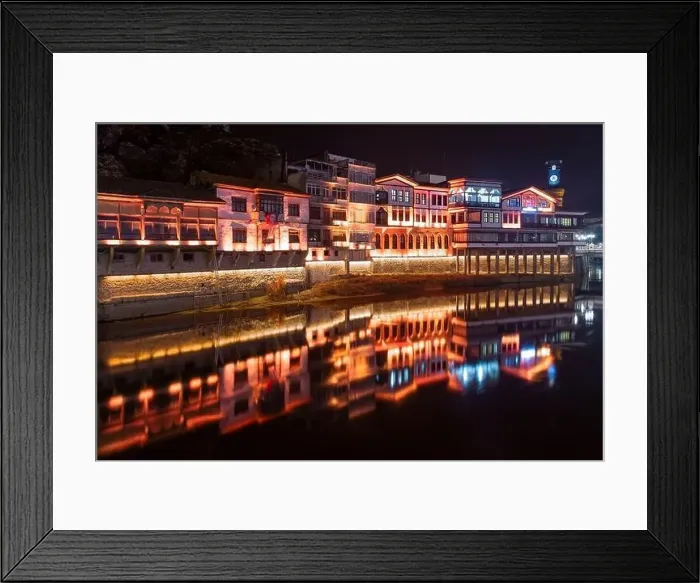 Framed Print : Amasya, Turkey - December 22, 2022 : Old Ottoman houses and clock tower view by the Yesilirmak River in Amasya City Framed Print : Amasya, Turkey - December 22, 2022 : Old Ottoman houses and clock tower view by the Yesilirmak River in Amasya City