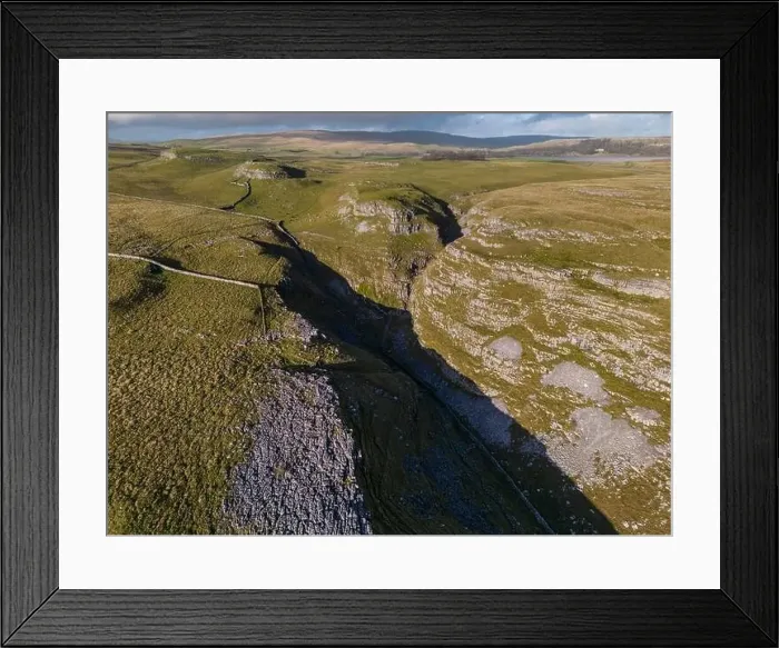 Framed Print : Aerial views of Limestone Pavement near Malham with Comb Hill and Dean Moor Hill in the distance Framed Print : Aerial views of Limestone Pavement near Malham with Comb Hill and Dean Moor Hill in the distance