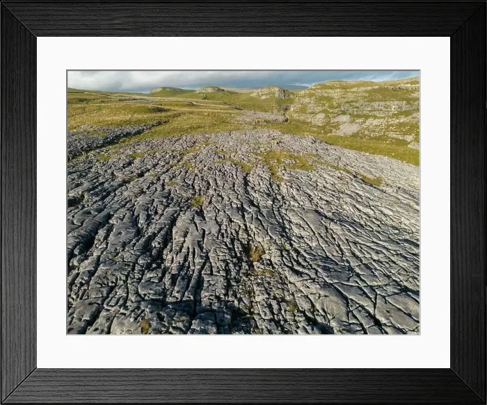 Framed Print : Aerial views of Limestone Pavement near Malham with Comb Hill and Dean Moor Hill in the distance Framed Print : Aerial views of Limestone Pavement near Malham with Comb Hill and Dean Moor Hill in the distance