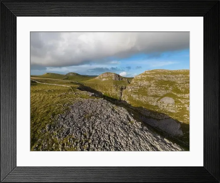 Framed Print : Aerial views of Limestone Pavement near Malham with Comb Hill and Dean Moor Hill in the distance Framed Print : Aerial views of Limestone Pavement near Malham with Comb Hill and Dean Moor Hill in the distance