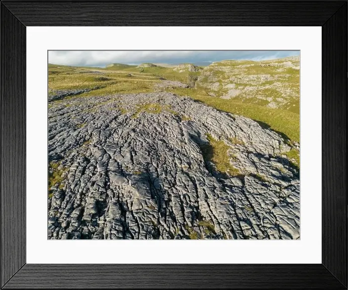 Framed Print : Aerial views of Limestone Pavement near Malham with Comb Hill and Dean Moor Hill in the distance Framed Print : Aerial views of Limestone Pavement near Malham with Comb Hill and Dean Moor Hill in the distance