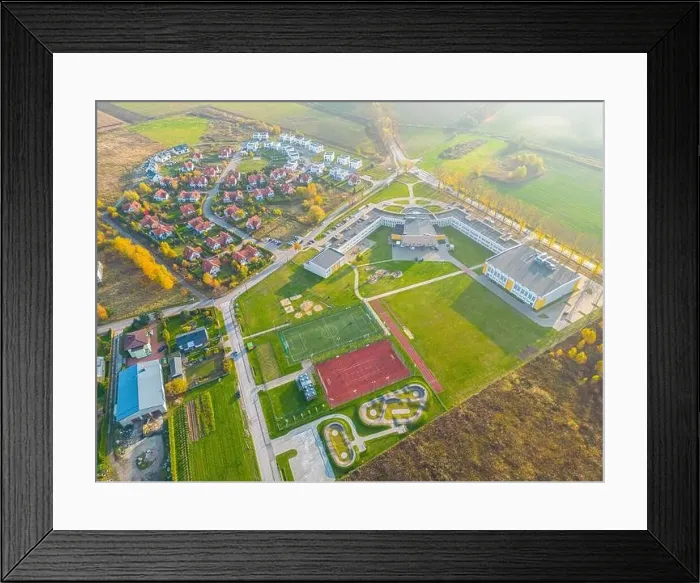 Framed Print : Aerial view of small european town with sradium and sport field, panorama Framed Print : Aerial view of small european town with sradium and sport field, panorama