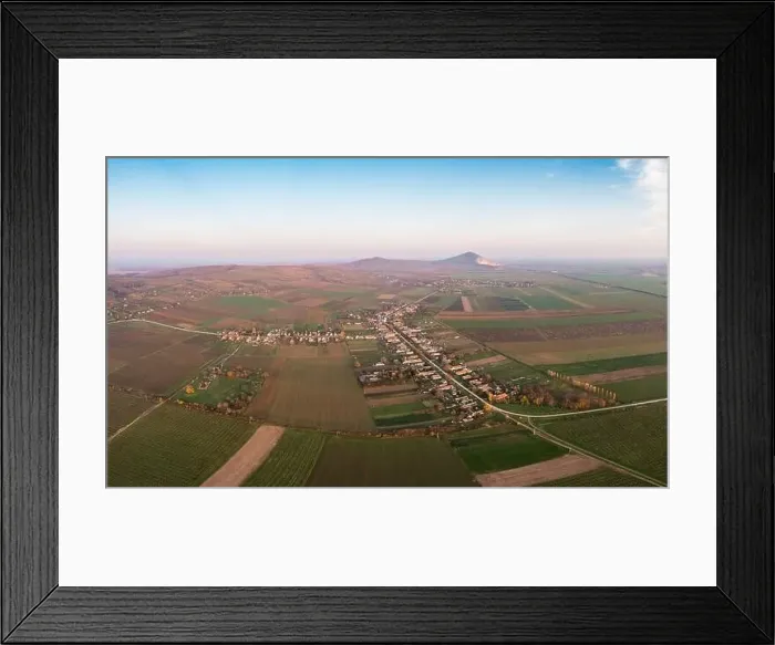 Framed Print : Aerial view of Szarsomlyo mountain with small village in Hungary Framed Print : Aerial view of Szarsomlyo mountain with small village in Hungary