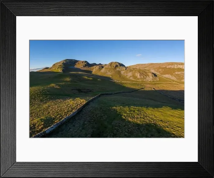 Framed Print : An aerial view of a collection of Limestone Hills situated near the North Yorkshire Village of Settle, UK Framed Print : An aerial view of a collection of Limestone Hills situated near the North Yorkshire Village of Settle, UK
