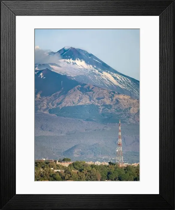 Framed Print : Snow covered Mount Etna volcano and Catania city center at sunrise Framed Print : Snow covered Mount Etna volcano and Catania city center at sunrise