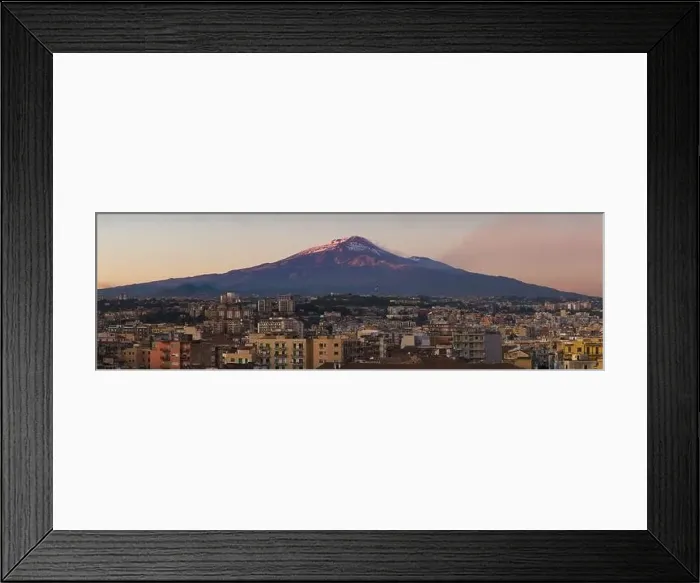 Framed Print : Snow covered Mount Etna volcano and Catania city center at sunset, from vantage point in Sicily, Italy Framed Print : Snow covered Mount Etna volcano and Catania city center at sunset, from vantage point in Sicily, Italy