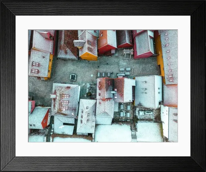 Framed Print : Roofs Covered with Snow. Aerial View