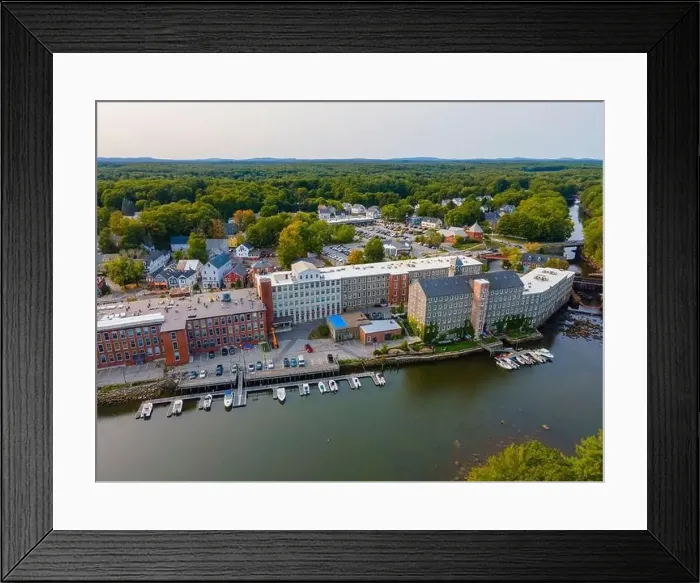 Framed Print : Newmarket Mills building aerial view on Lamprey River on Main Street in historic town center of Newmarket Framed Print : Newmarket Mills building aerial view on Lamprey River on Main Street in historic town center of Newmarket