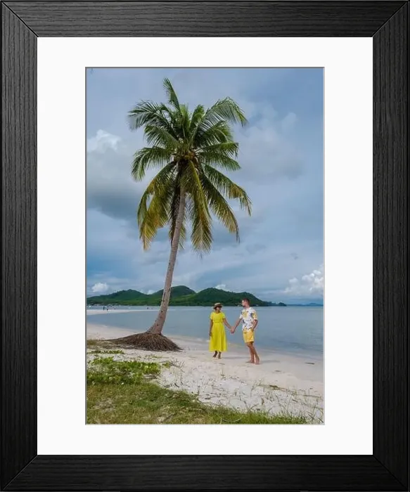 Framed Print : Couple men and women walking on the beach at the Island Koh Yao Yai thailand, beach with white sand and palm trees Framed Print : Couple men and women walking on the beach at the Island Koh Yao Yai thailand, beach with white sand and palm trees