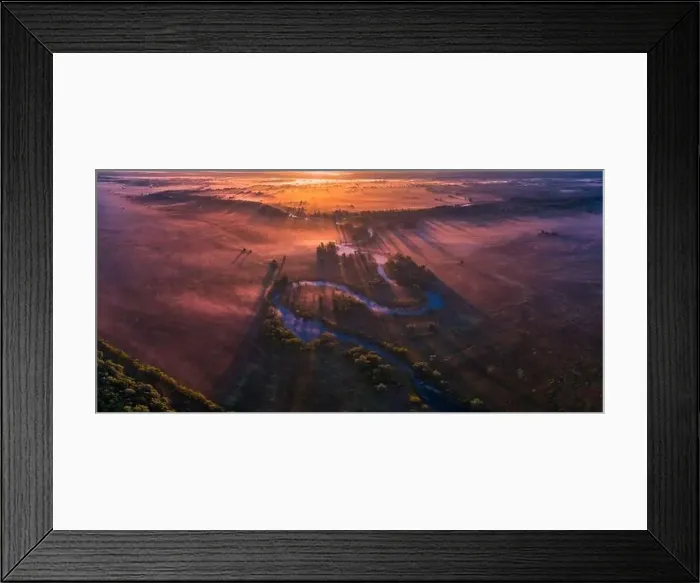 Framed Print : The channel and bends of the river, on a marshy meadow. Orange dry grass, scorched by the summer heat, and morning fog Framed Print : The channel and bends of the river, on a marshy meadow. Orange dry grass, scorched by the summer heat, and morning fog