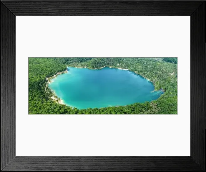 Framed Print : Clean lake with blue water in a pine forest. Drone view. A wonderful summer landscape. Wild untouched nature Framed Print : Clean lake with blue water in a pine forest. Drone view. A wonderful summer landscape. Wild untouched nature