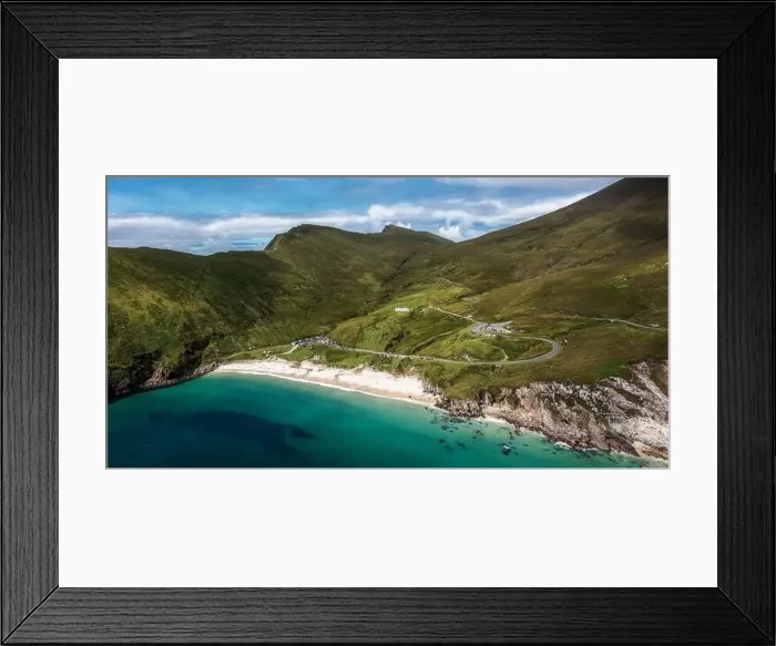 Framed Print : Winding clifftop road leads to picturesque Keem Bay and beach on Achill Island in County Mayo in western Ireland
