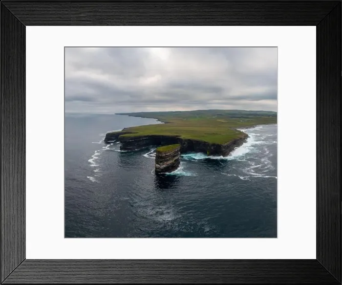 Framed Print : Drone view of the Downpatrick Head sea stack and cliffs and coastline of northern County Mayo in Ireland Framed Print : Drone view of the Downpatrick Head sea stack and cliffs and coastline of northern County Mayo in Ireland
