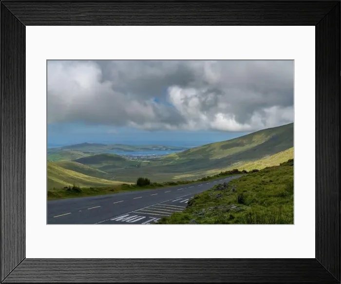 Framed Print : The steep and winding mountain road leading to the top of Connor Pass on the Dingle Peninsula Framed Print : The steep and winding mountain road leading to the top of Connor Pass on the Dingle Peninsula