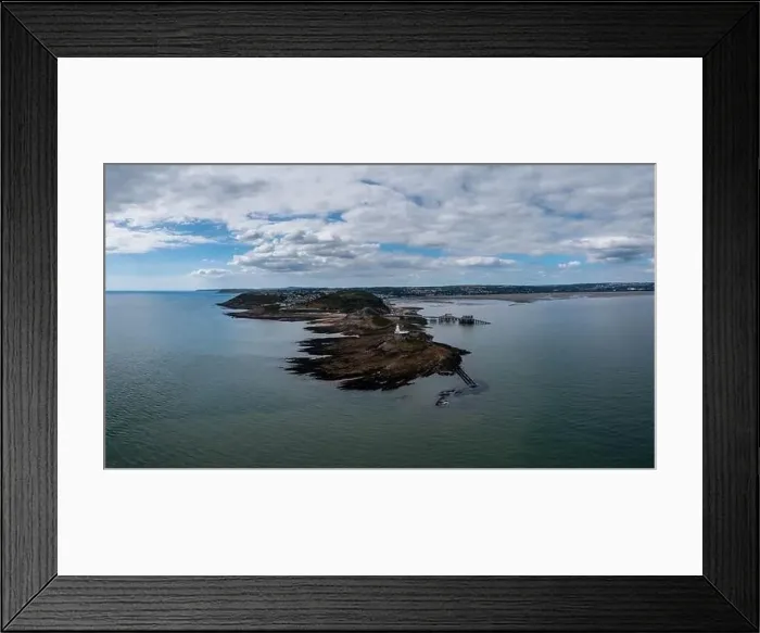 Framed Print : View of the Mumbles headland with the historic lighthouse and piers in Swansea Bay Framed Print : View of the Mumbles headland with the historic lighthouse and piers in Swansea Bay