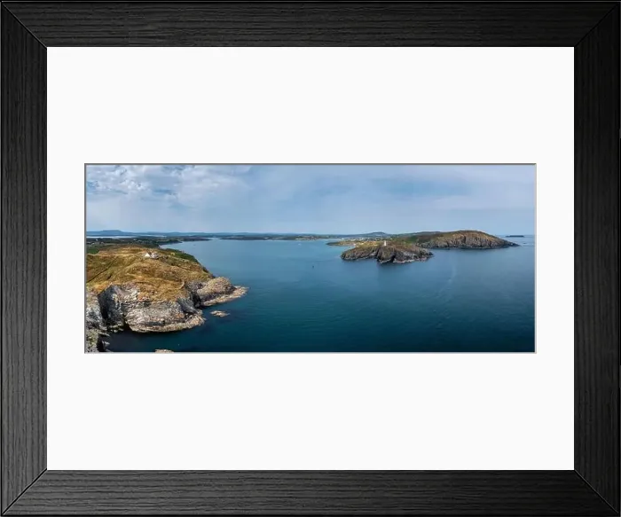 Framed Print : A panorama view of the entrance to the Baltimore Harbor in West Cork with teh Sherkin Island Lighthouse Framed Print : A panorama view of the entrance to the Baltimore Harbor in West Cork with teh Sherkin Island Lighthouse