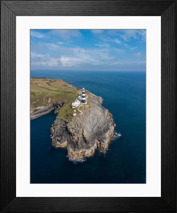 Framed Print : Vertical view of the lighthouse and the Old Head of Kinsale in County Cork of western Ireland
