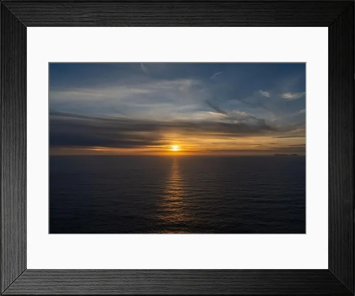 Framed Print : Seascape backdrop of a calm Atlantic Ocean at sunset with an expressive sky Framed Print : Seascape backdrop of a calm Atlantic Ocean at sunset with an expressive sky