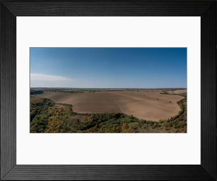 Framed Print : Drone view of endless brown plowed agricultural fields on the Danubian Plain of Bulgaria Framed Print : Drone view of endless brown plowed agricultural fields on the Danubian Plain of Bulgaria