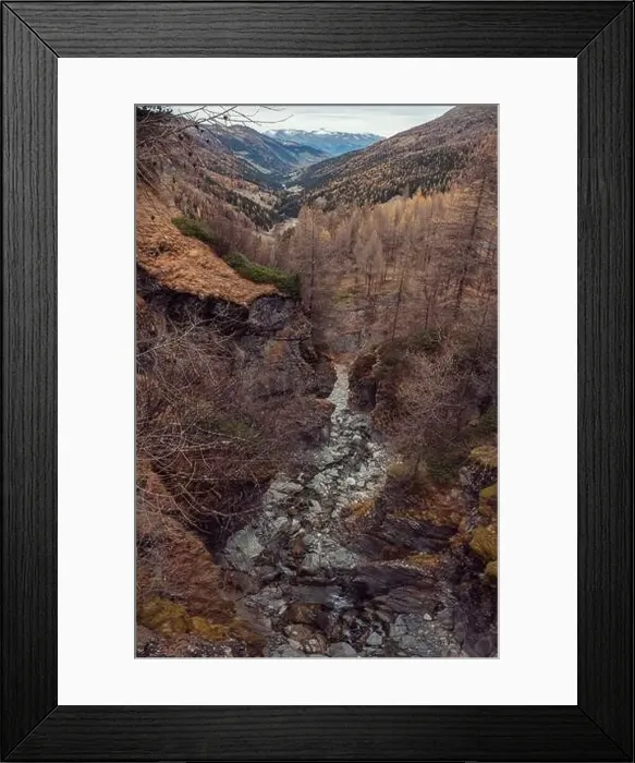 Framed Print : Stunning drone footage of an alpine valley in Autumn with different coloured trees Framed Print : Stunning drone footage of an alpine valley in Autumn with different coloured trees